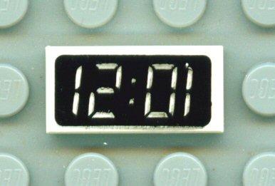 Tile 1 x 2 with Groove with Digital Clock with '12:01' / '10:21' on Black Background Pattern 3069px5 Used